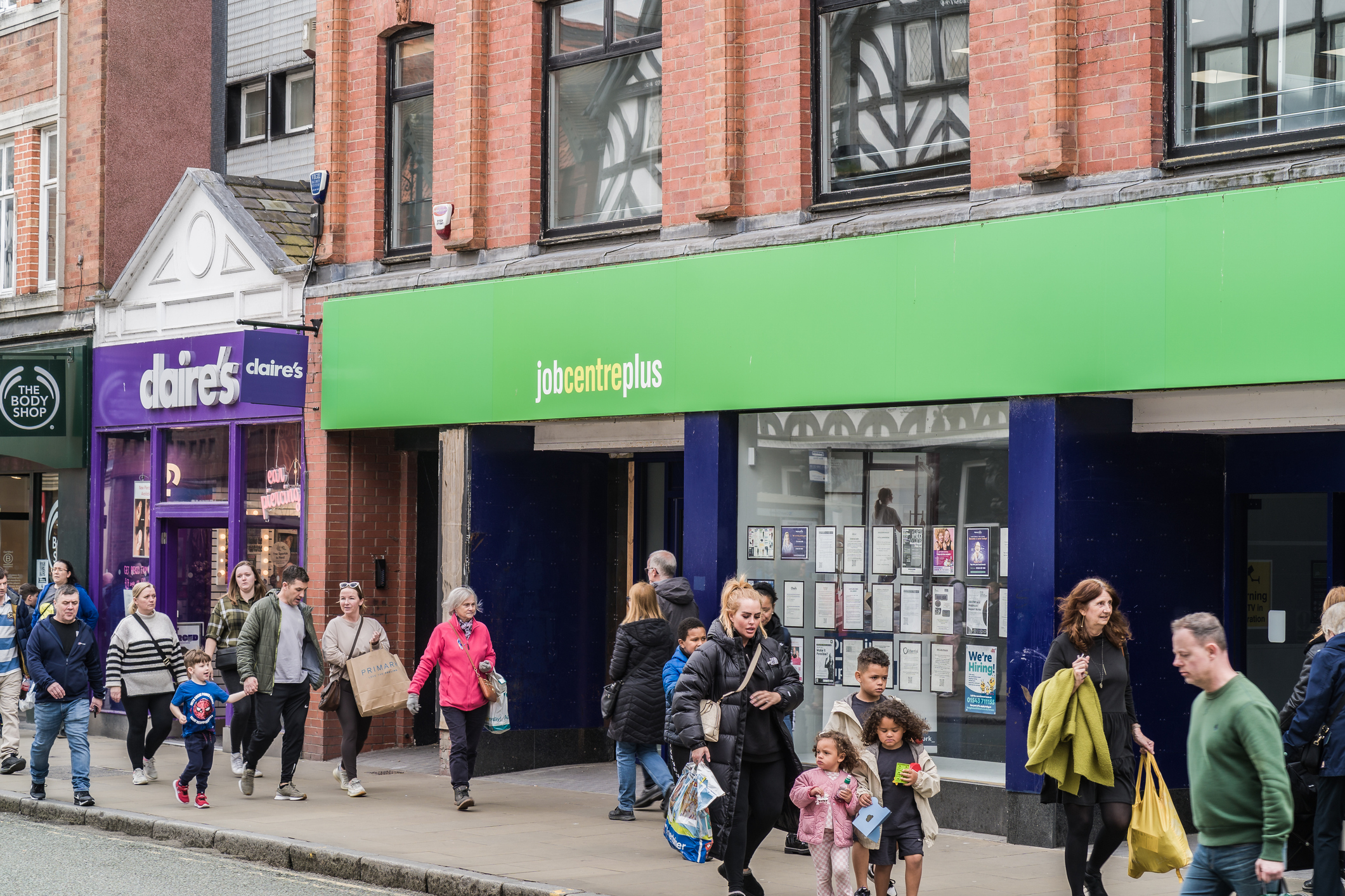 People walking past a job centre in Chester, UK. The UK&#039;s labour market is weakening, but a cut to interest rates appears unlikely.