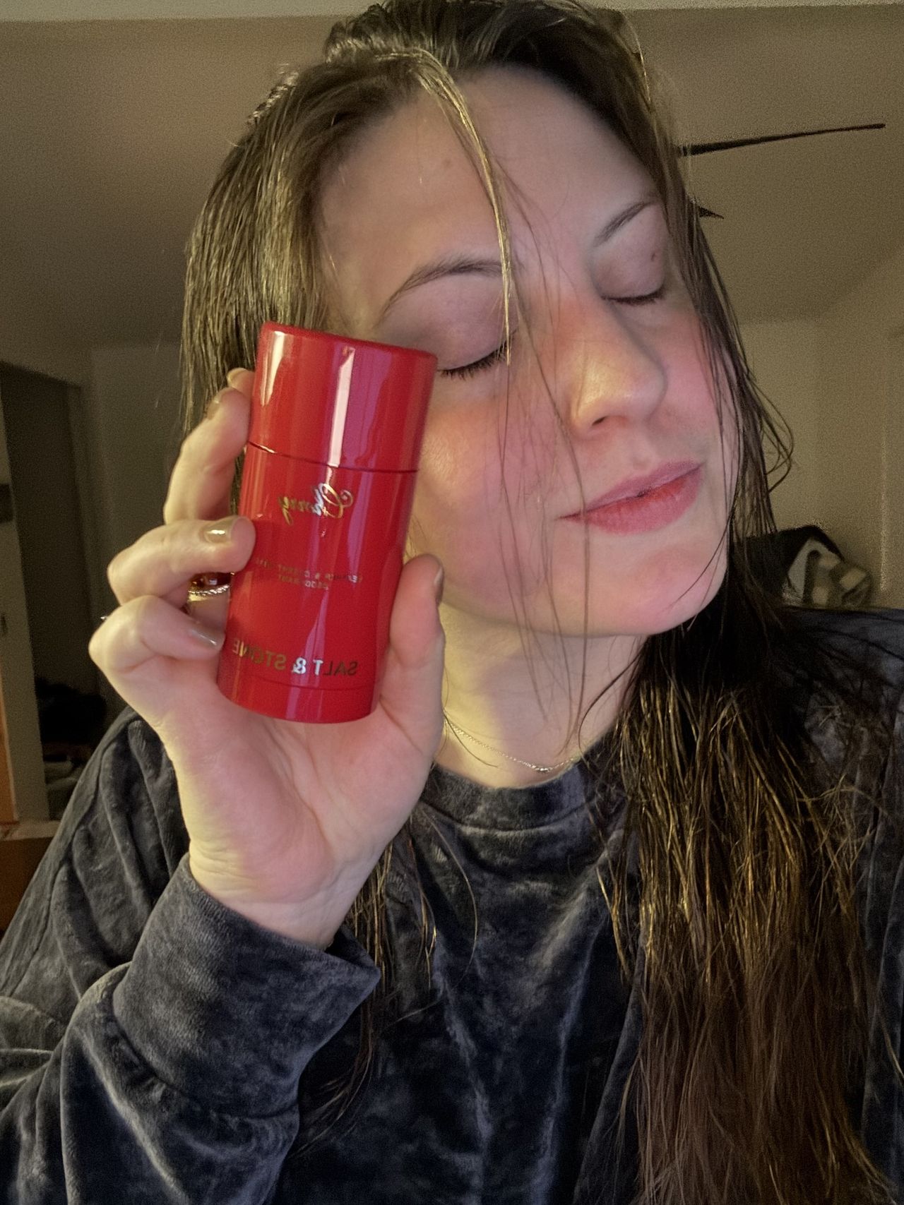 Sophia Vilensky before applying Salt &amp; Stone's natural deodorant.