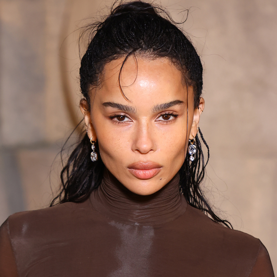 Zo&euml; Kravitz attended the Saint Laurent Fall 2026 show in a chocolate brown turtleneck look from the label