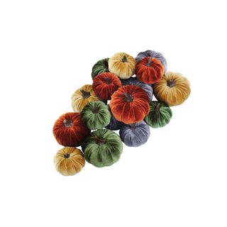 Assorted small velvet pumpkins in red, green, gold, and blue
