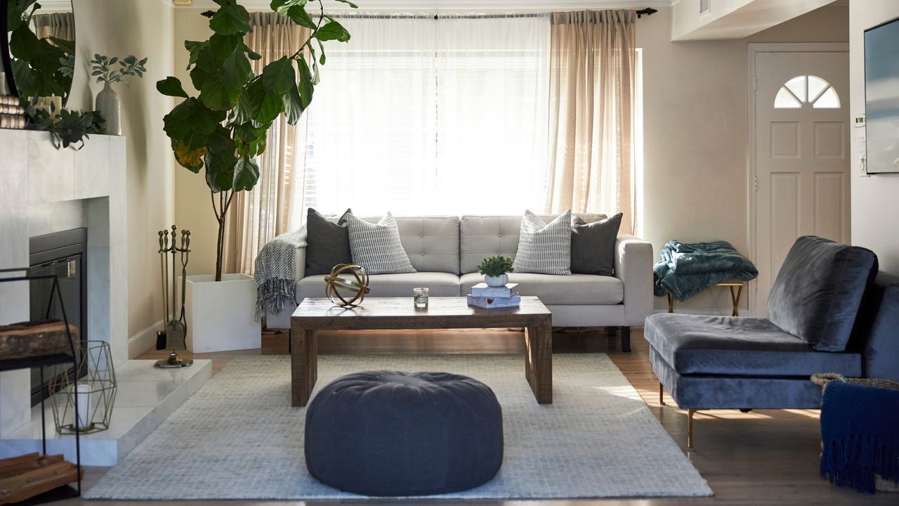 Modern bright living room with couch and light from window behind