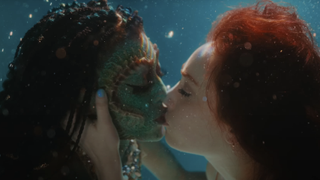 Chappell Roan kissing a mermaid underwater in Casual music video