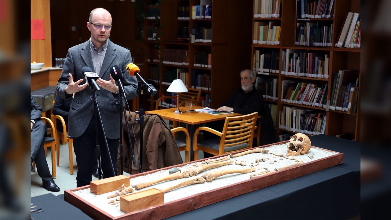 The collection of medical tools was found in two wooden chests in a Roman-era grave near the central Hungarian city of J&aacute;szber&eacute;ny. Here we see a man standing in front of a table with a skeleton laid out with the medical tools around it. They are in a library.