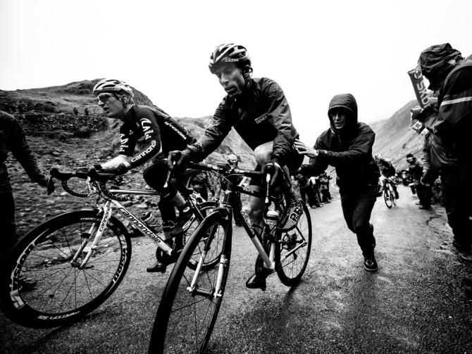 Dean Downing gets a push on Honister Pass during the Tour of Britain.