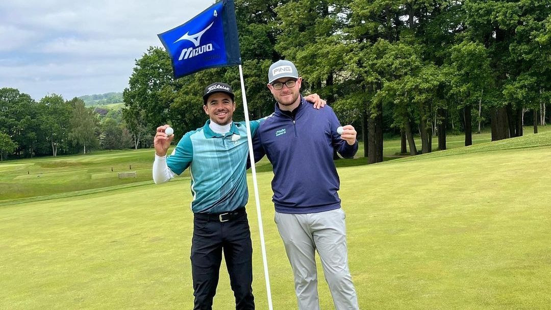 Austin Bautista and George Mason stand by the hole after the pair hit successive aces