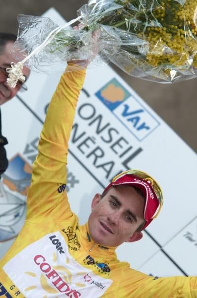 Samuel Dumoulin in yellow on the podium.