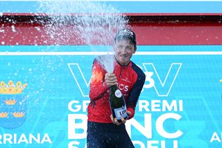 ALTURA SPAIN FEBRUARY 04 Tao Geoghegan Hart of The United Kingdom and Team INEOS Grenadiers celebrates at podium as stage winner during the 74th Volta a la Comunitat Valenciana 2023 Stage 4 a 1816km stage from Burriana to Alto de la Cueva Santa Altura 832m VCV2023 VoltaValenciana on February 04 2023 in Altura Spain Photo by Dario BelingheriGetty Images