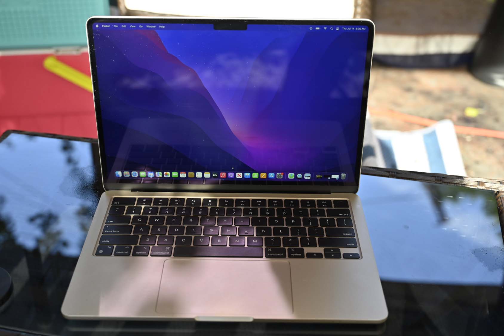 MacBook Air M2 laptop on a black table