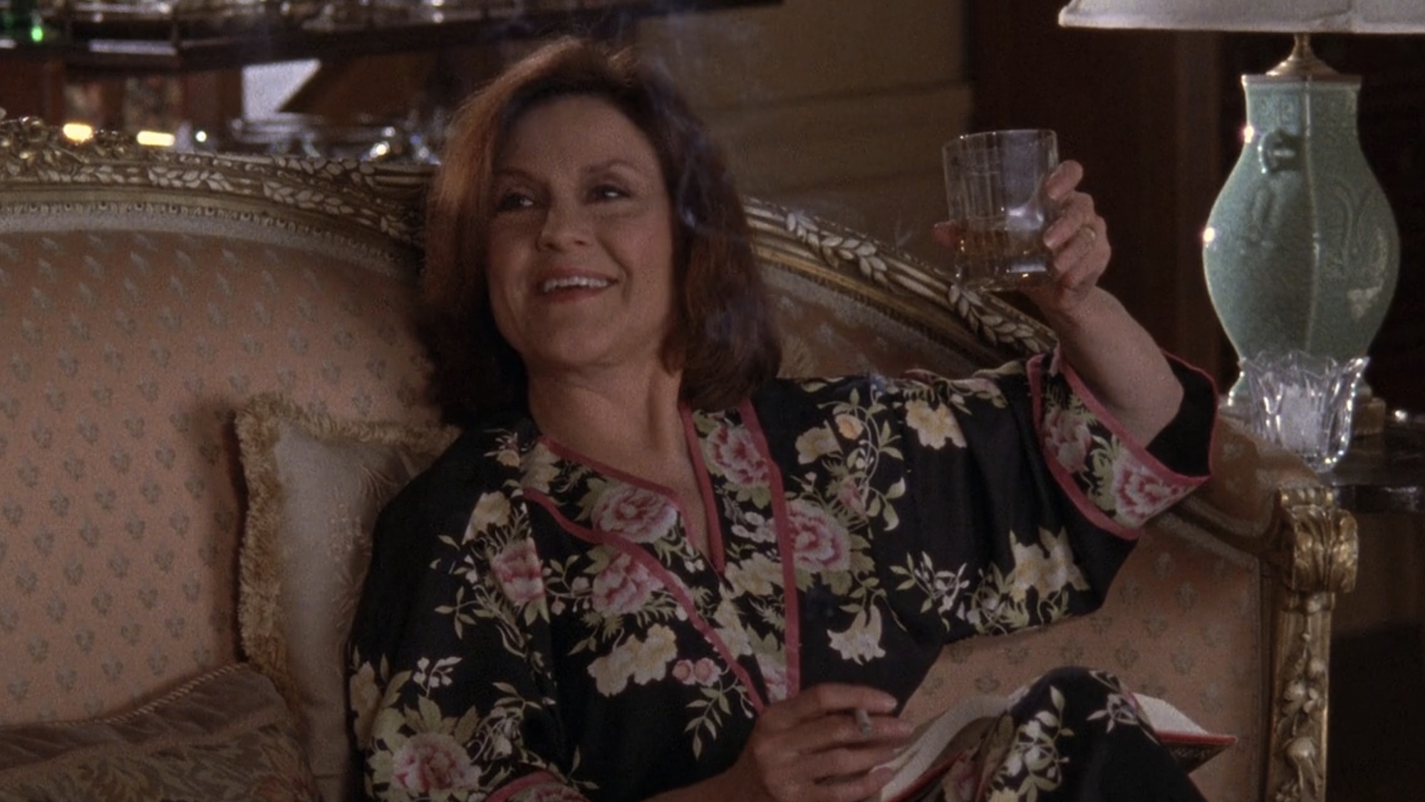 Emily Gilmore drinking and smoking a cigarette.