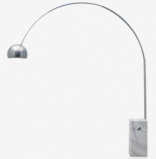 A silver arched floor lamp 