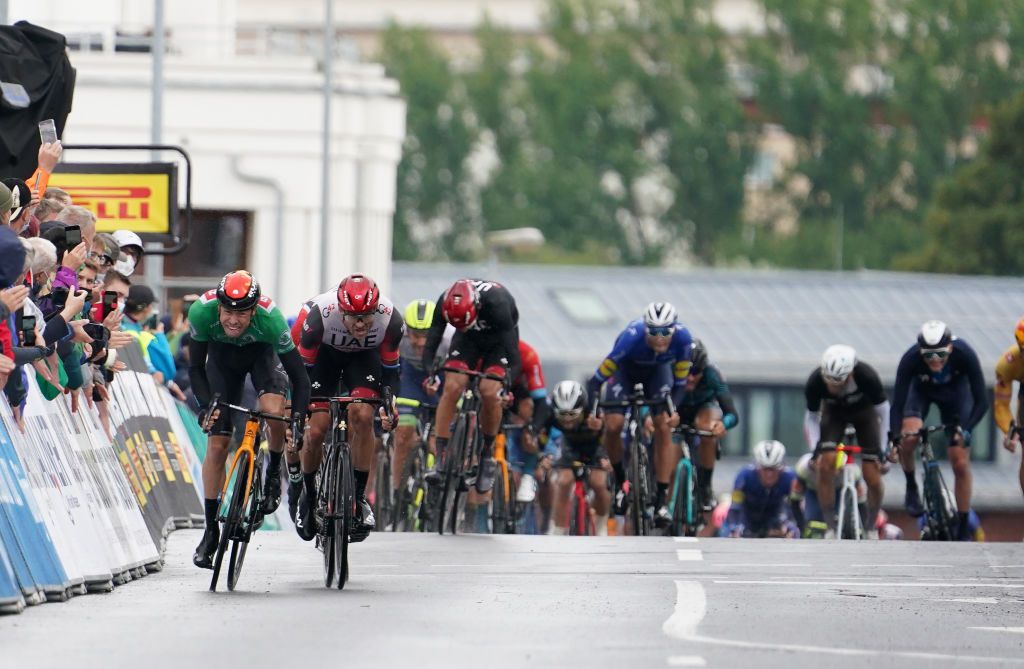 ILMENAU GERMANY AUGUST 27 LR Phil Bauhaus of Germany and Team Bahrain Victorious green points jersey and Alexander Kristoff of Norway and UAE Team Emirates sprint to win during the 35th Deutschland Tour 2021 Stage 2 a 1806km stage from Sangerhausen to Ilmenau DeineTour on August 27 2021 in Ilmenau Germany Photo by Christian KasparBartkeGetty Images
