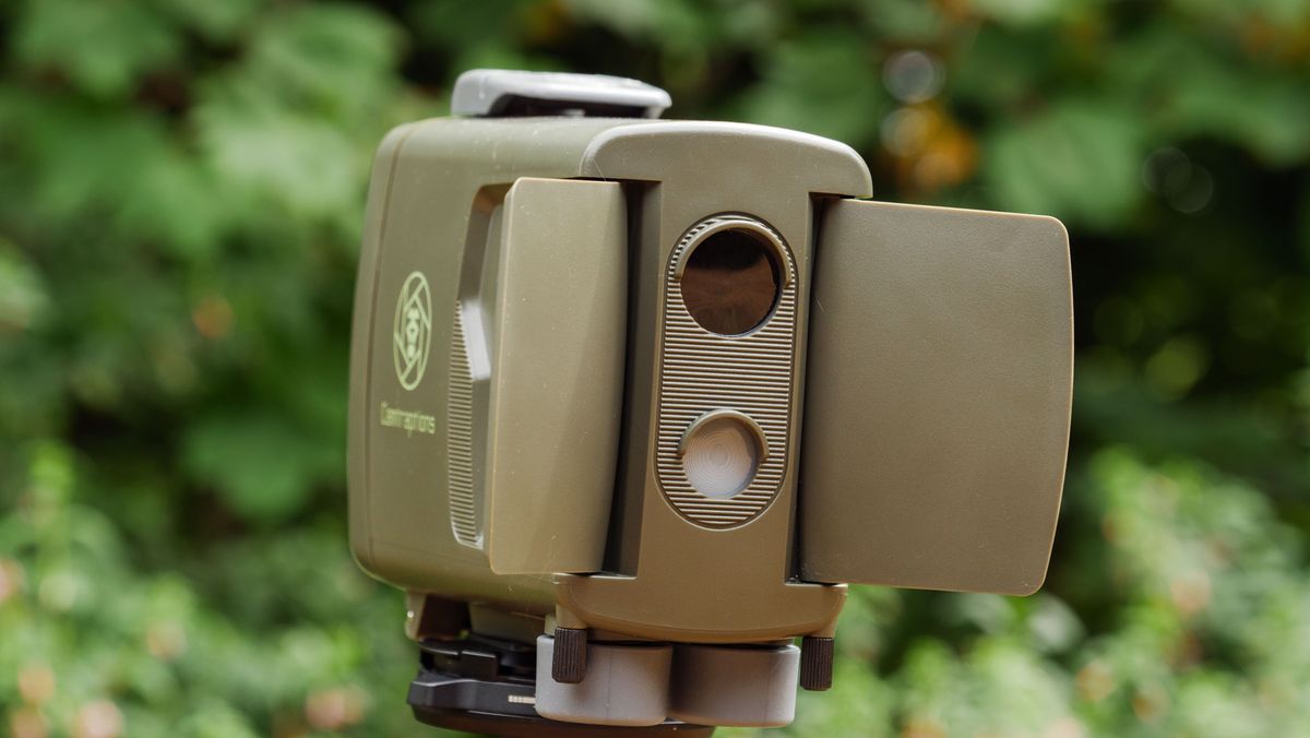 Camtraptions Camera Trap device outdoors with foliage backdrop