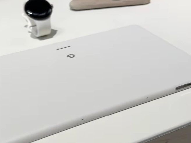 Pixel Tablet laid on a table along with other Google devices