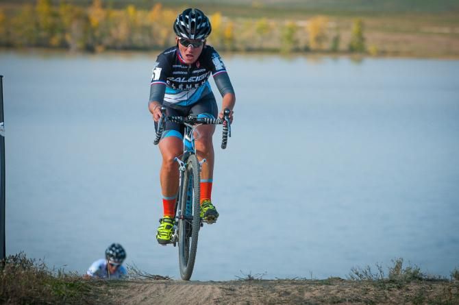 Caroline Mani (Raleigh Clement) enters the sand pit after leaving the shores of Boulder Reservoir. Colorado Cross Classic.
