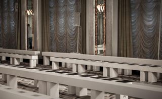 Pringle catwalk in the the private ball room at Claridge's, white bench seating and silk draped windows