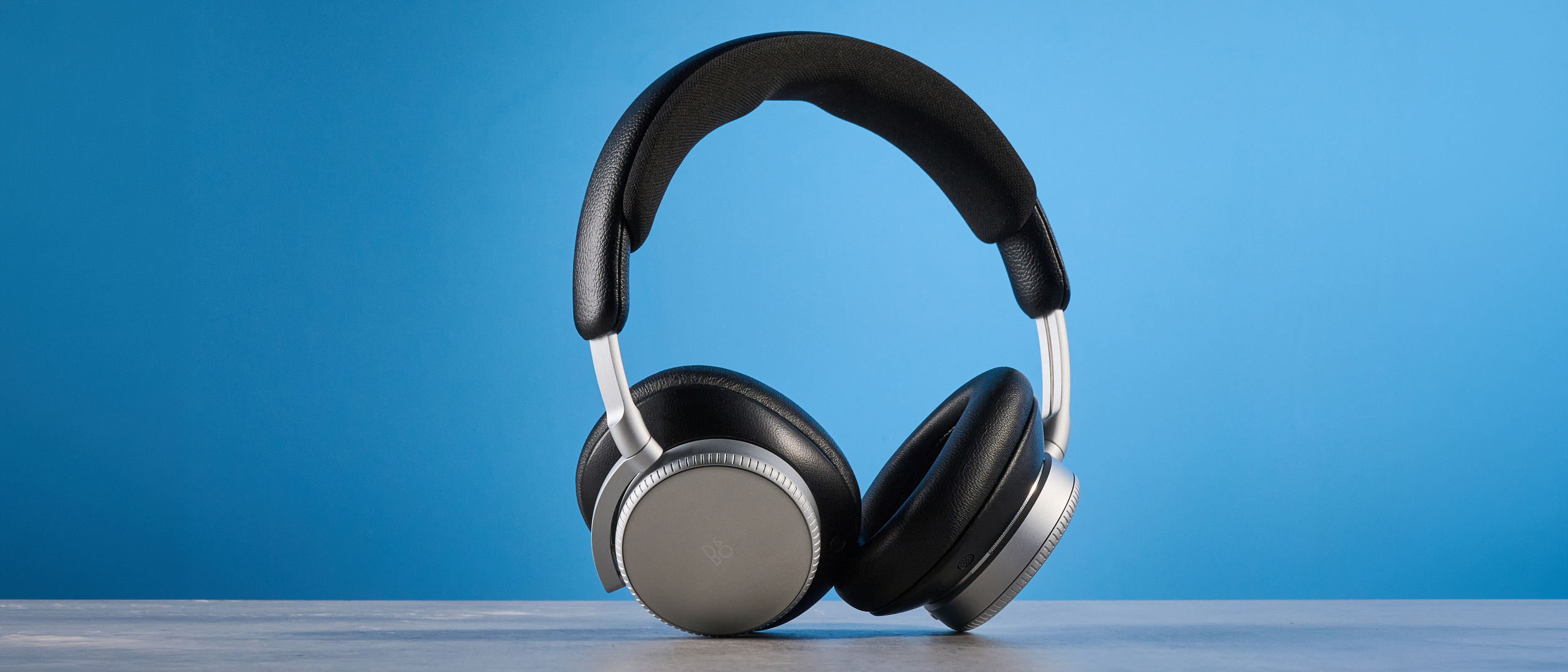 The Bang &amp; Olufsen Beoplay H100 on a blue background