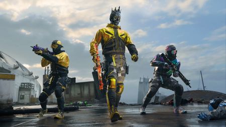 Three stylishly dressed soldiers show off their weapons in a warzone