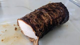A smoked pork tenderloin cooked in the Ninja Woodfire Grill