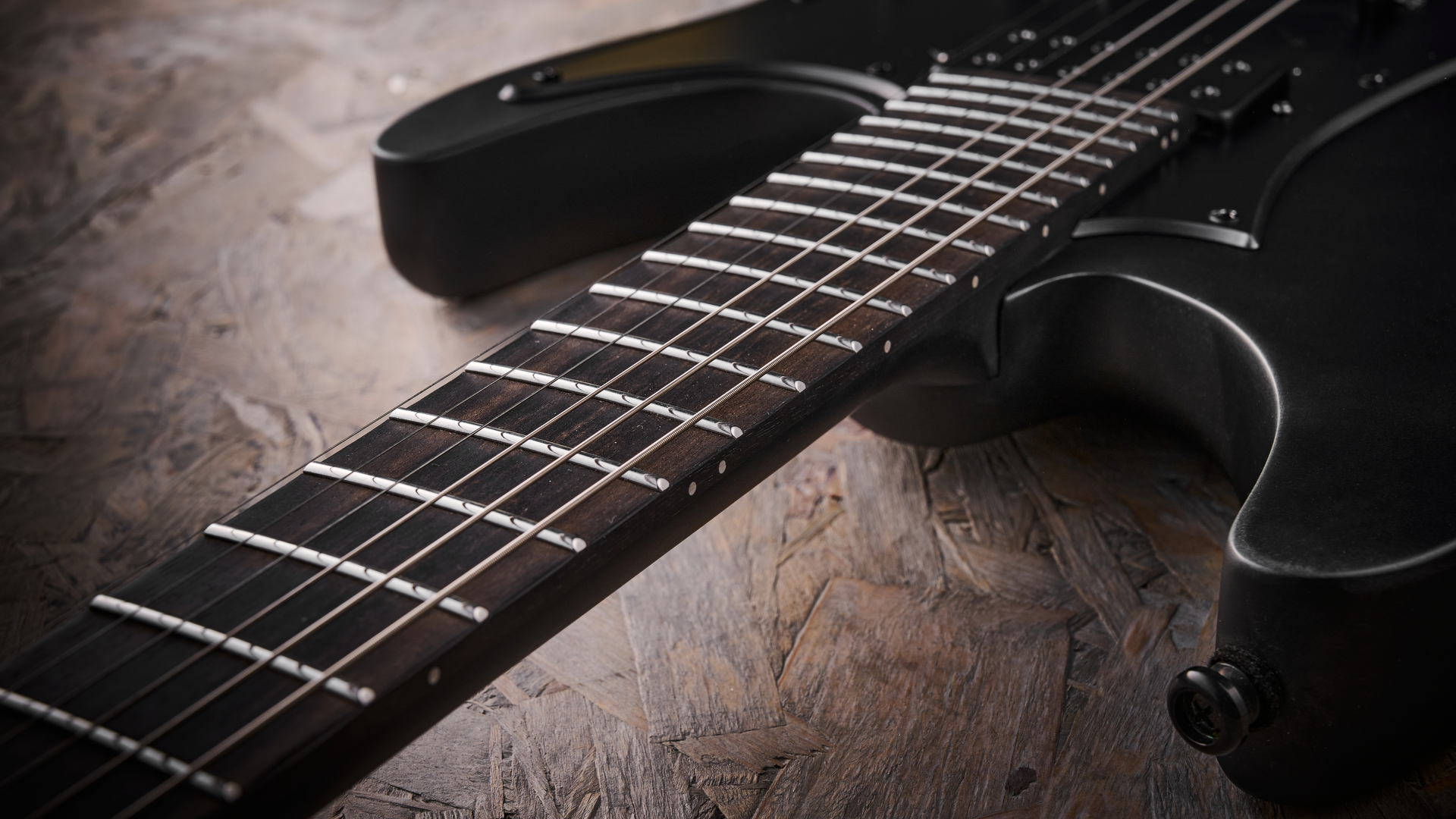 The ebony fretboard of the Ibanez Iron Label AZA41B1 electric guitar