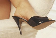 Marie Claire Health News: Woman Wearing Black Stilettos