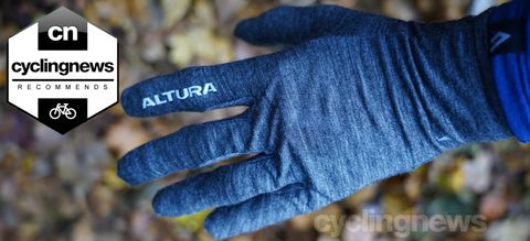 a close-up of an Altura Merino liner glove with recommends badge overlaid