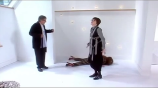 two women's one men with white wall and white flooring