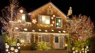 Christmas lights on the outside of a detached house