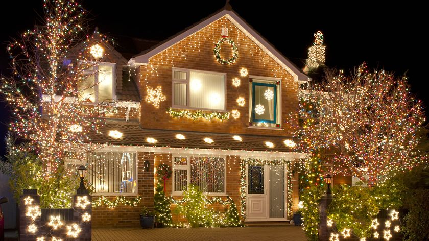 Christmas lights on the outside of a detached house