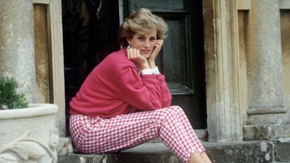 Princess Diana sitting on a step at her home, Highgrove House in the late 1980s