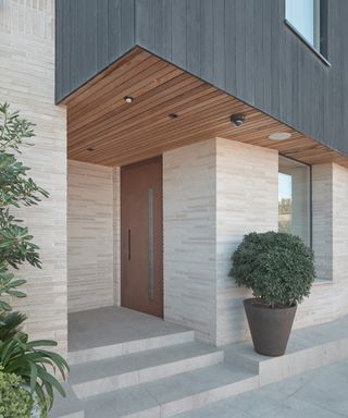 contemporary porch with oversized front door