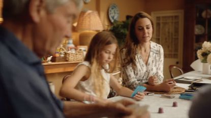 Michael Middleton playing cards with Princess Charlotte and Kate Middleton