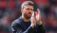 Manchester United head coach Michael Carrick applauds the fans during the Premier League match against Nottingham Forest at Old Trafford on May 17, 2026 in Manchester, United Kingdom