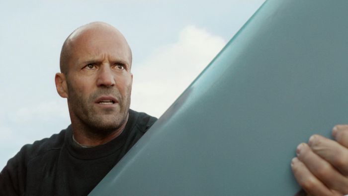 Jonas (Jason Statham) holding a pole in a scene from "Meg 2: The Trench"
