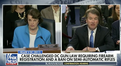 Brett Kavanaugh answers a question about weapons during his hearing.