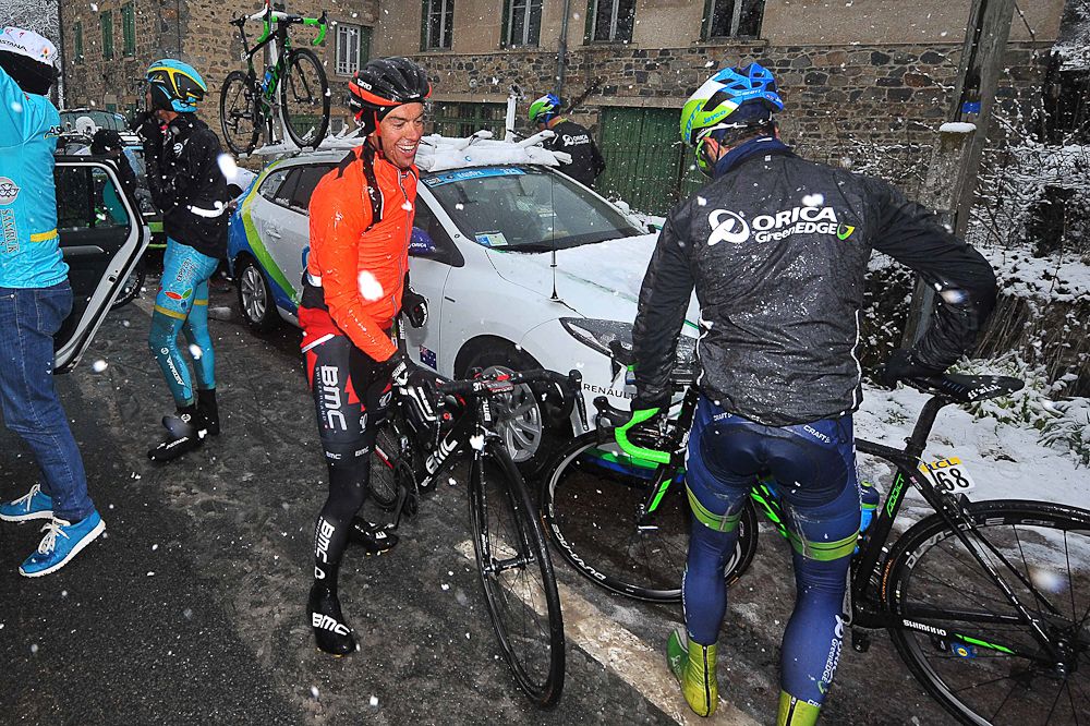 BMC's Richie Porte climbs off his bike