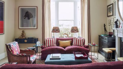 Living room with bay window, two sofas and coffee table