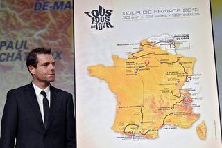 2011 Tour de France champion Cadel Evans peruses the 2012 parcours.