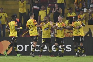 Barcelona SC players celebrate a goal against Cobresal in the Copa Libertadores in May 2024.