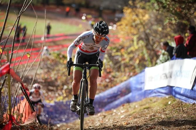 Durrin, in the overall Verge NECXS Elite Women's jersey, riding up the Cycle-Smart ramp