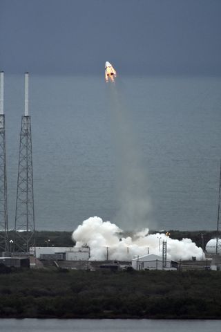 SpaceX's Dragon crew capsule launches on an unmanned abort system test on May 6, 2015 from Cape Canaveral Air Force Station in Florida. The test lasted less than 2 minutes.