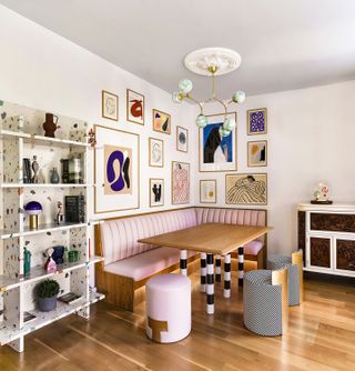 modern banquette with pink seats in a white kitchen