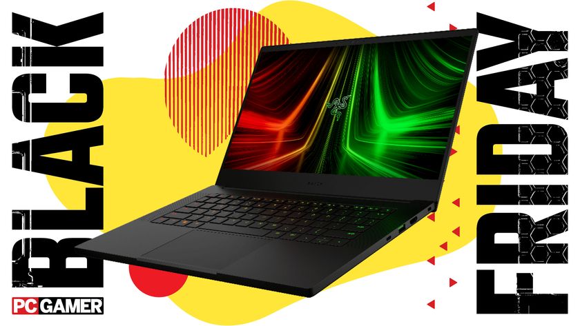 The Razer Blade 14 2025 gaming laptop on a colourful Black Friday deals background, with the PC Gamer logo in the bottom right