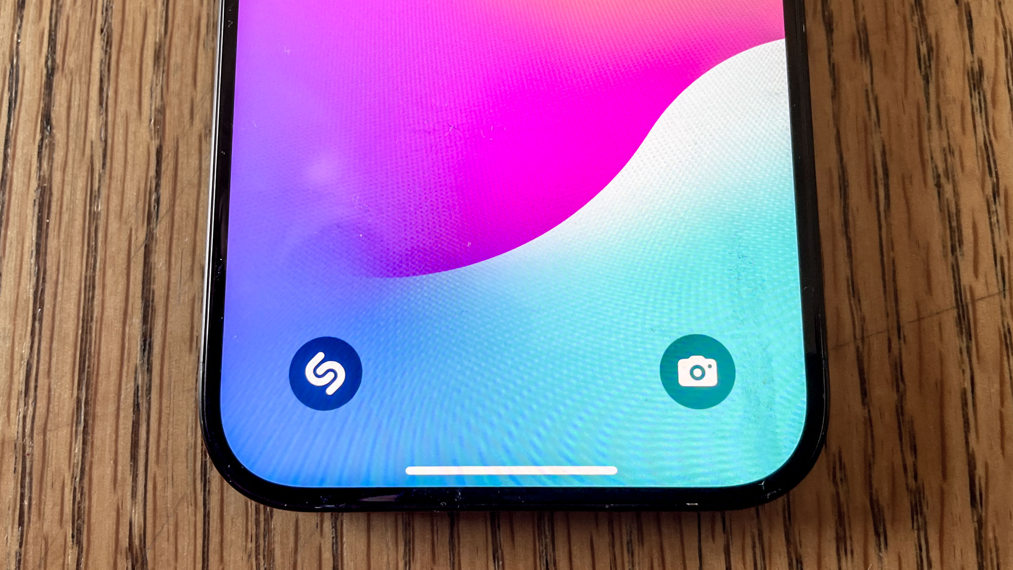 Identify the Music lock screen widget with the Shazam logo