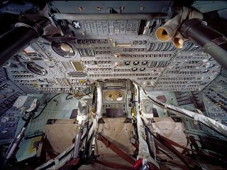 View inside the Apollo 11 command module Columbia with replica hand controllers installed in place of the real equipment, which was sold on July 18, 2020 by Julien's Auctions.
