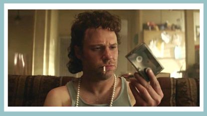 Seth Rogen as Rand Gauthier in Pam &amp; Tommy on Hulu with a blue border around the image