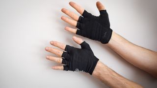 A pair of black Rapha cycling gloves
