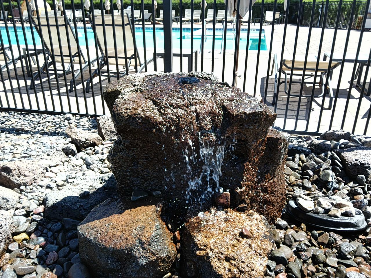 A rock with water coming from it