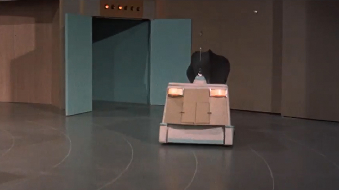 A robot vacuum in The Glass Bottom Boat