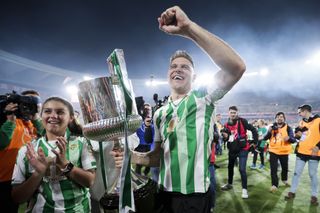 Joaquin celebrates with the Copa del Rey trophy after Real Betis' win over Valencia in April 2022.