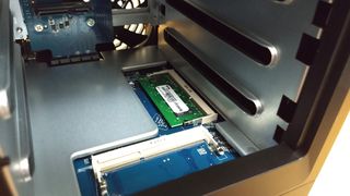 Adding extra RAM is well worth doing, and is as simple as taking out the drives and slotting your new stick in.